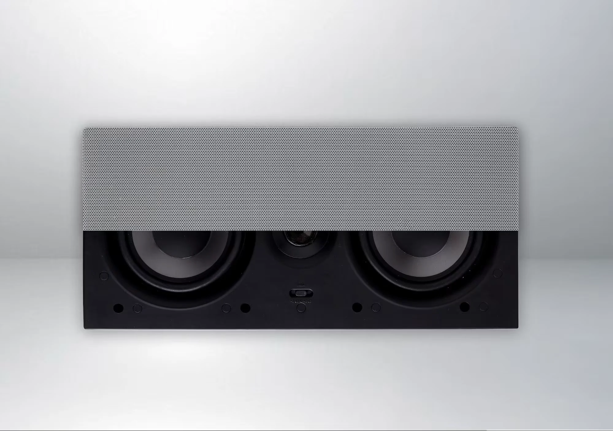 Premier Series speakers with a wooden media console